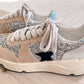 Shown with gray laces